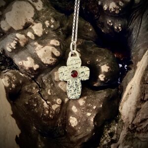 Sterling silver cross necklace with a Garnet stone